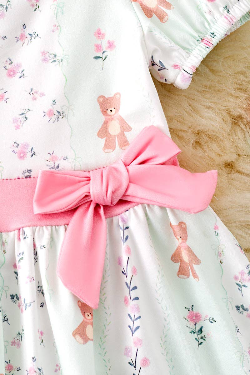 Teddy bear printed on bubble sleeve dress with pink side bow.