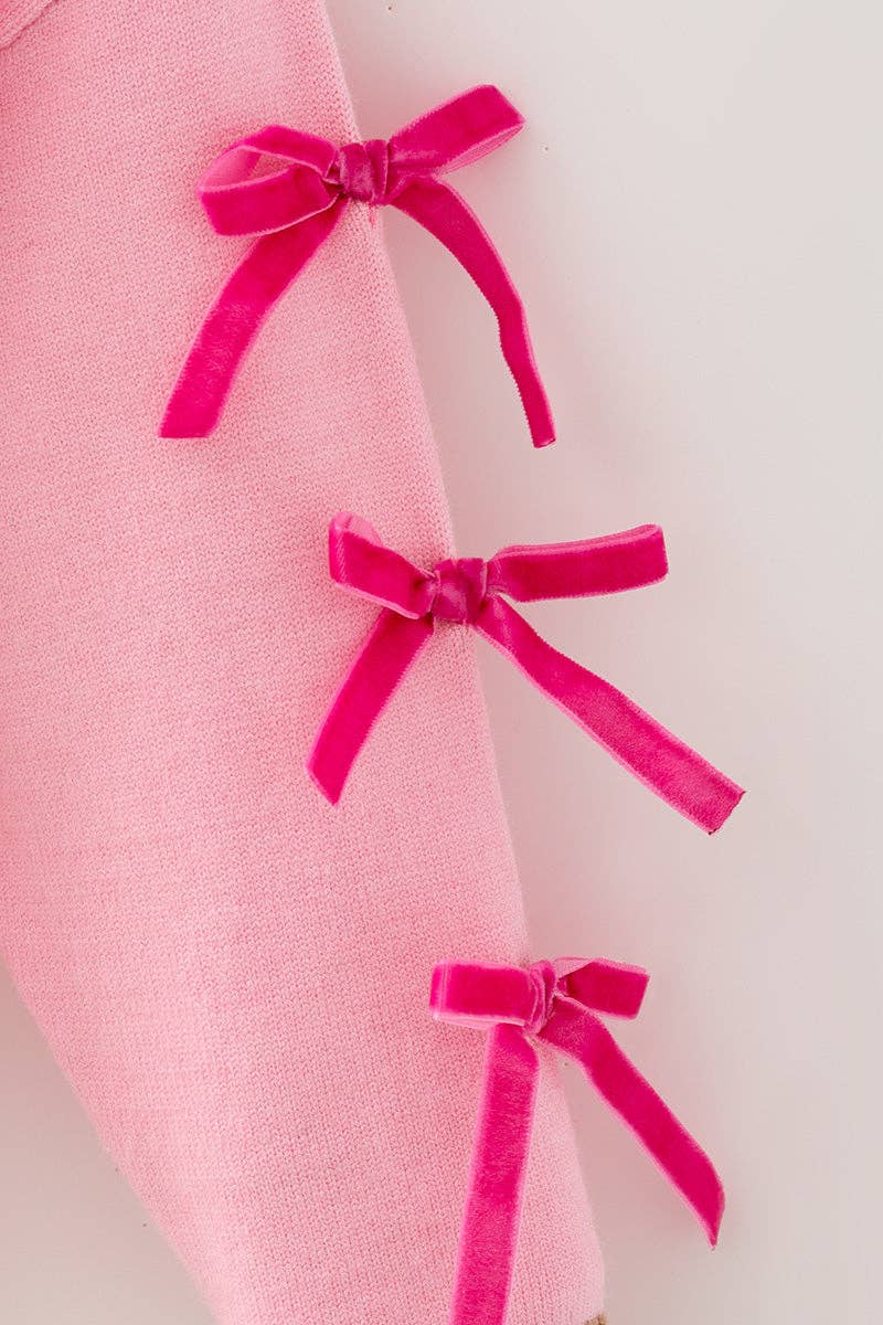 Ginger cookie pink knit sweater with bow on sleeves