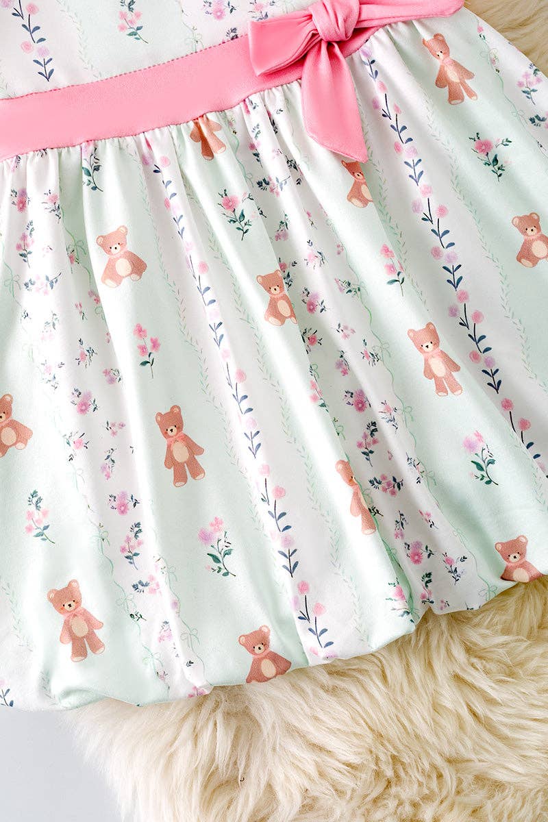 Teddy bear printed on bubble sleeve dress with pink side bow.