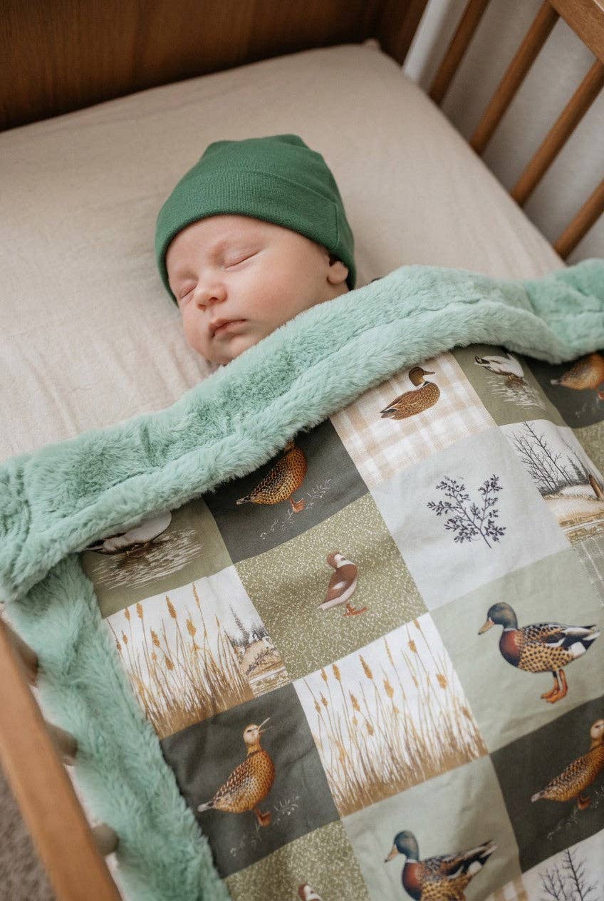 Duck duck baby blanket with mint faux fur.
