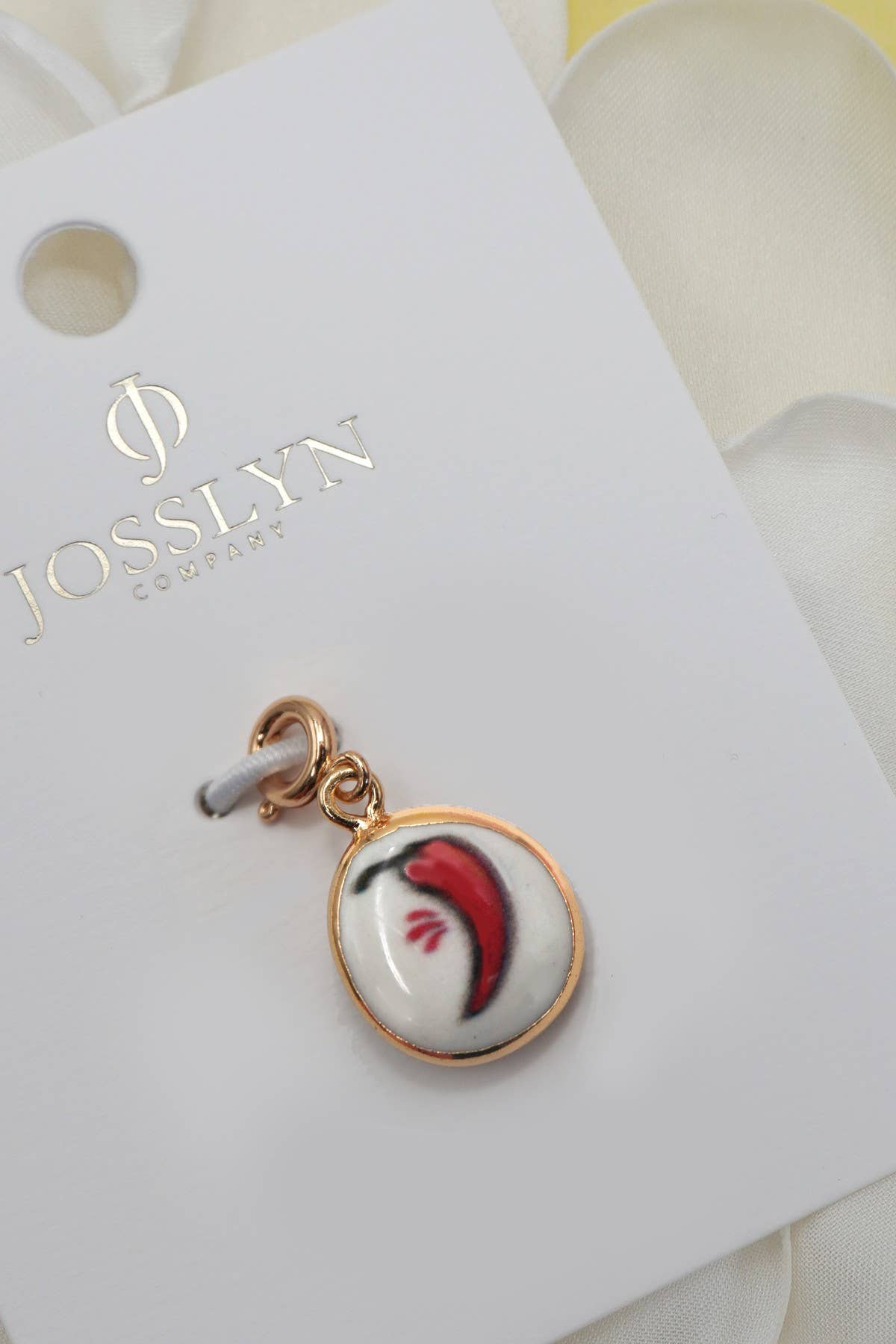 CHARM-PORCELAIN BOW WITH SPRING RING CLASP