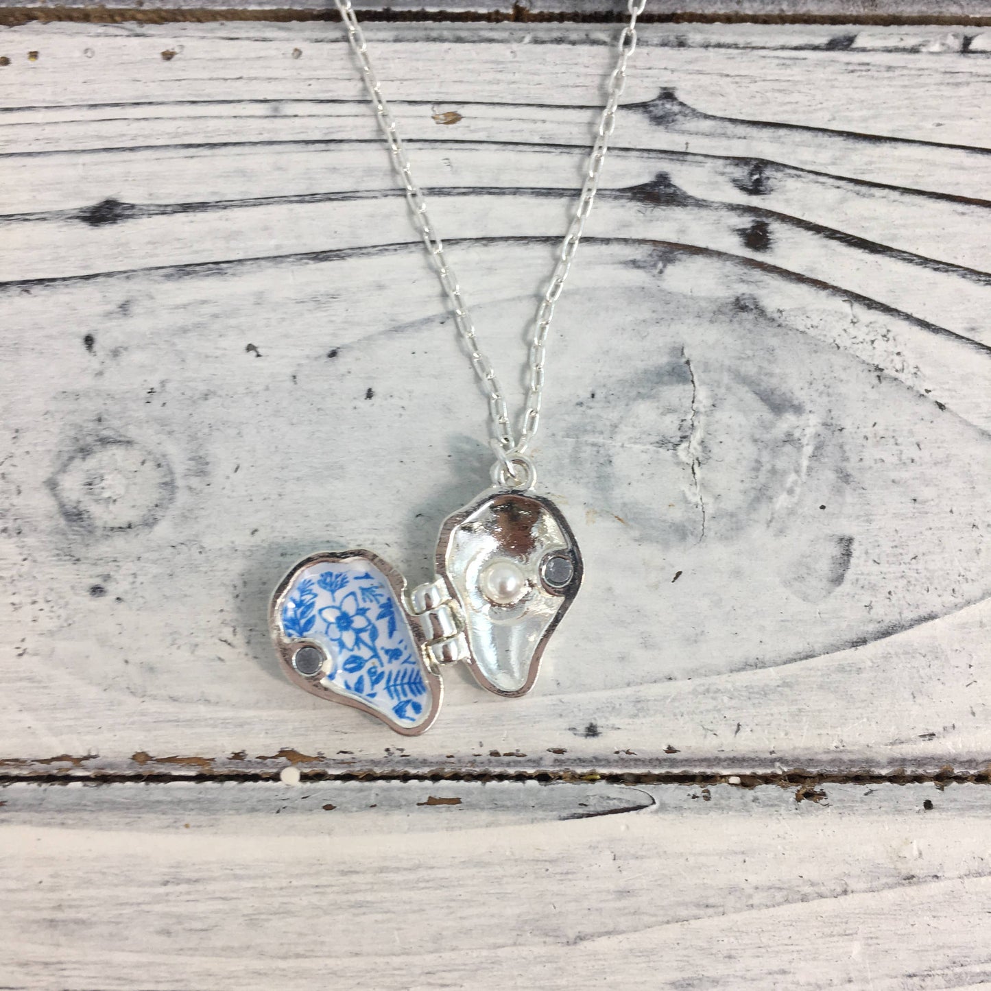 Oyster locket necklace
